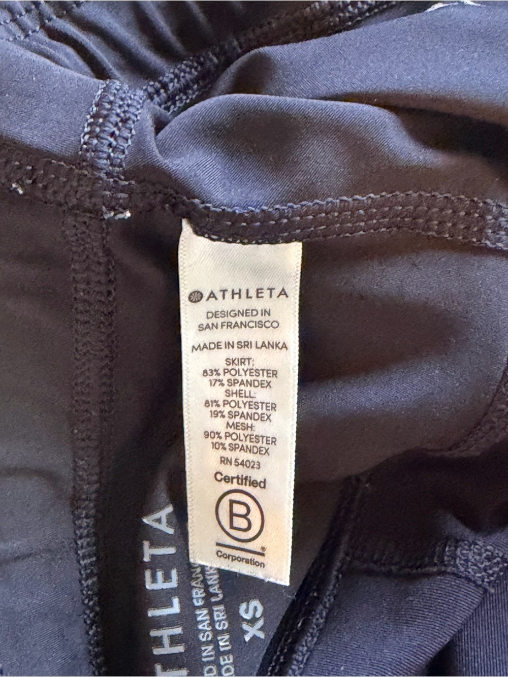 Athleta Momentum Skort Black Ruffle Tennis Running Golf Skirt XS EUC - Picture 9 of 11